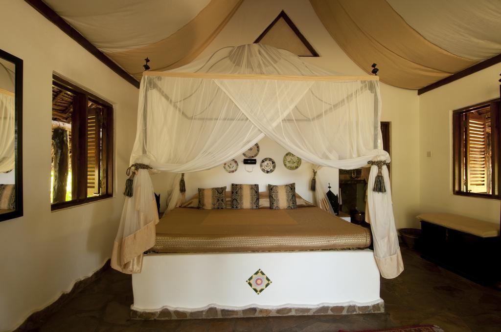 Kinasi Lodge Utende Habitación foto